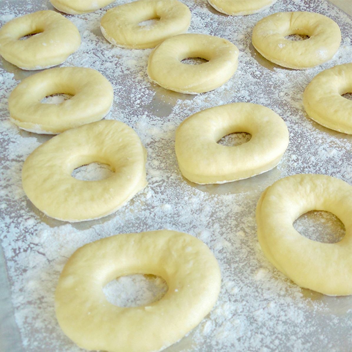 Place doughnuts on baking sheets